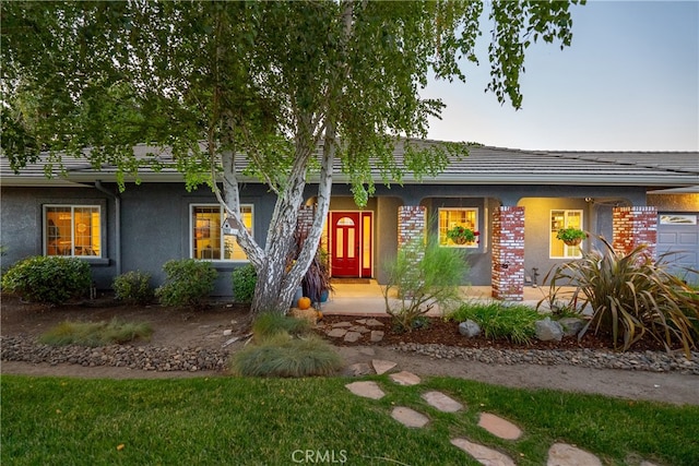 view of front of home with a garage