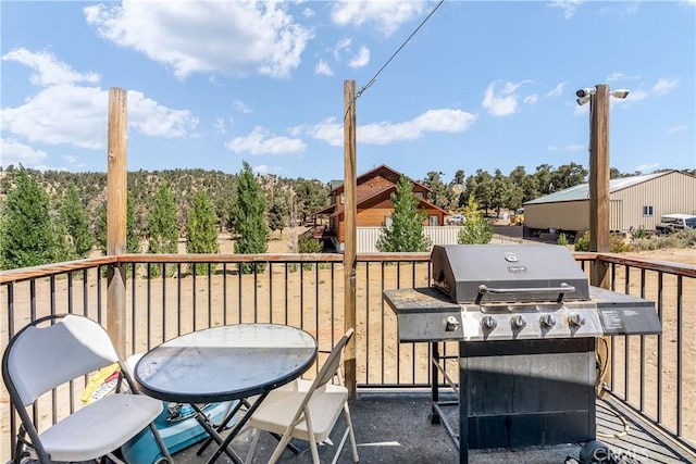 balcony featuring area for grilling