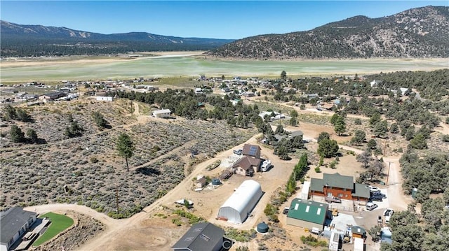 aerial view with a water and mountain view