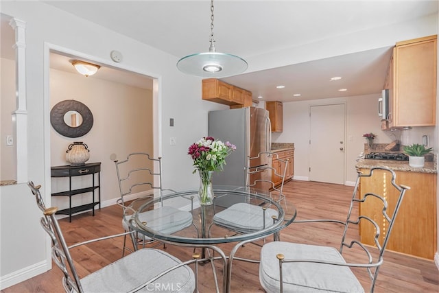 dining area featuring light hardwood / wood-style floors