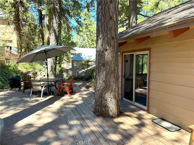 wooden deck featuring grilling area