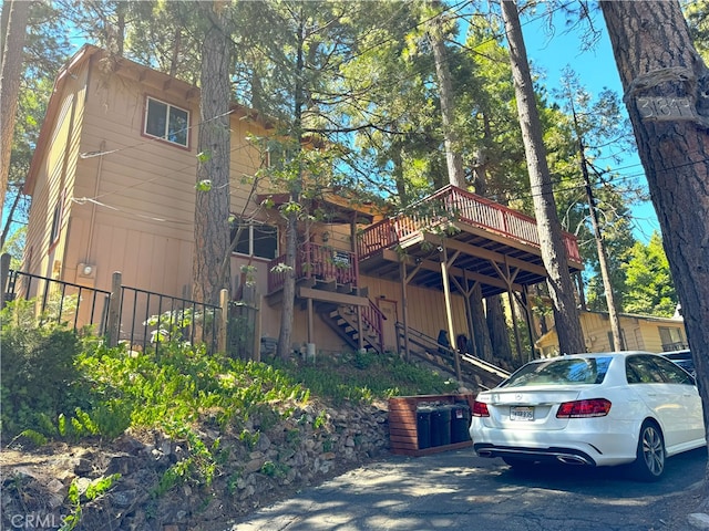 view of front of property featuring a deck