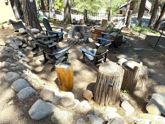 exterior space featuring an outdoor fire pit