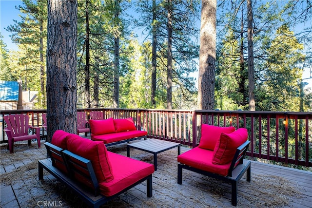 wooden deck featuring outdoor lounge area