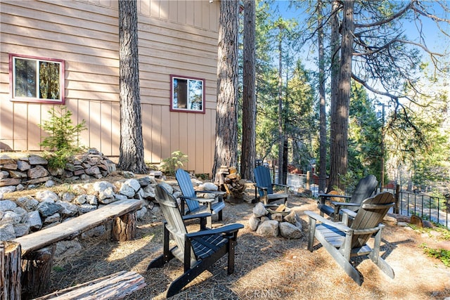 view of yard with an outdoor fire pit