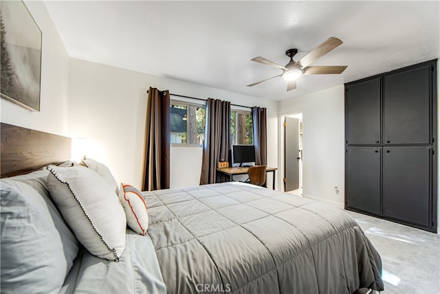 carpeted bedroom featuring ceiling fan