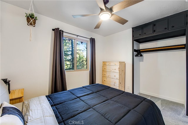 bedroom featuring carpet flooring, ceiling fan, and a closet