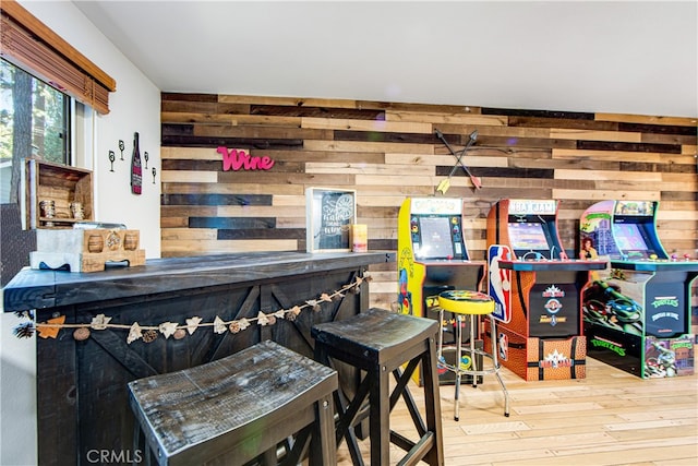 interior space featuring wooden walls and wood-type flooring