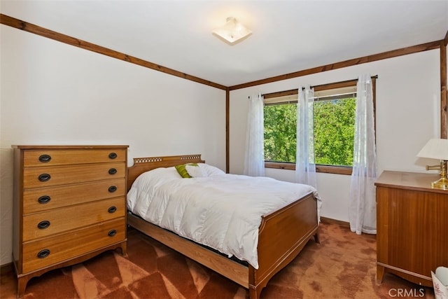 bedroom featuring carpet flooring and ornamental molding