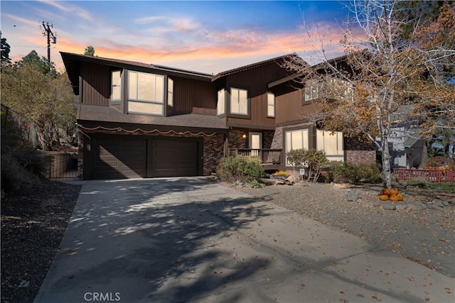 view of front facade featuring an attached garage and driveway