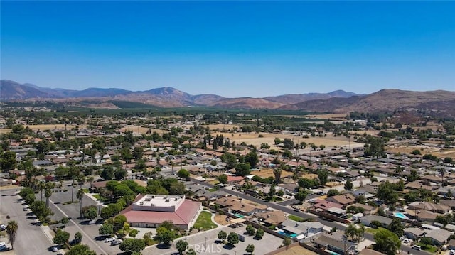 drone / aerial view featuring a mountain view