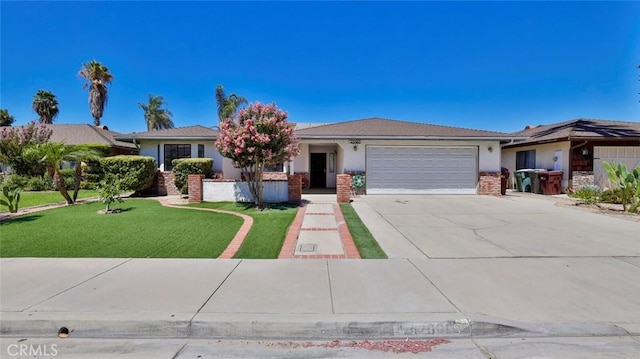 ranch-style house with a garage and a front yard