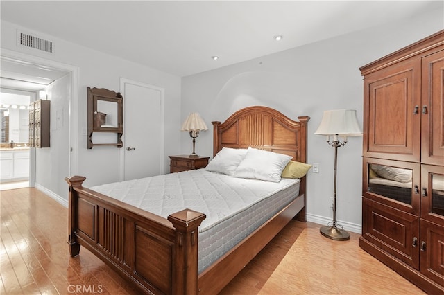 bedroom featuring light hardwood / wood-style flooring