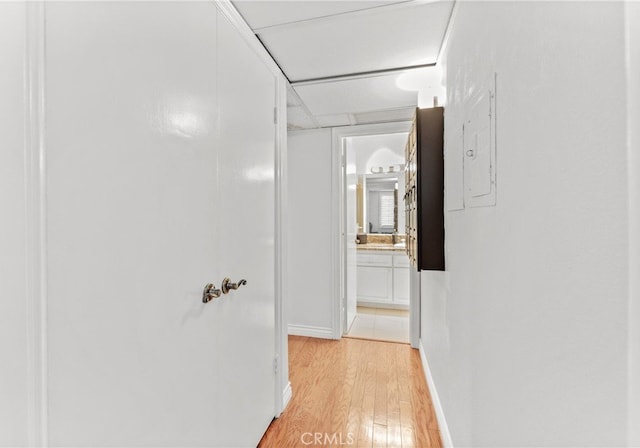 hallway featuring light wood-type flooring