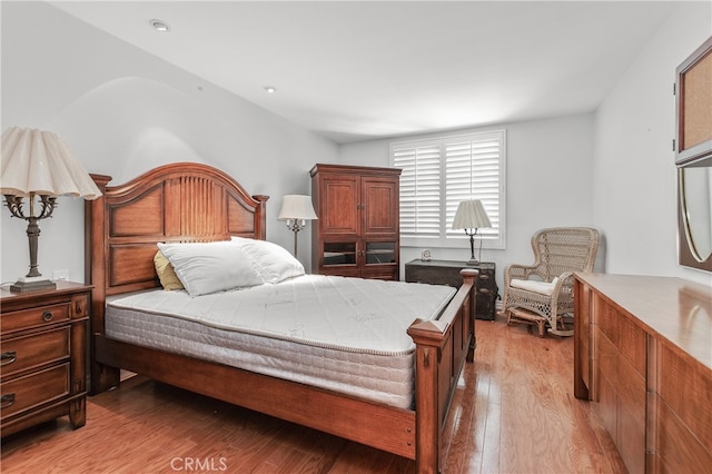 bedroom featuring light hardwood / wood-style floors