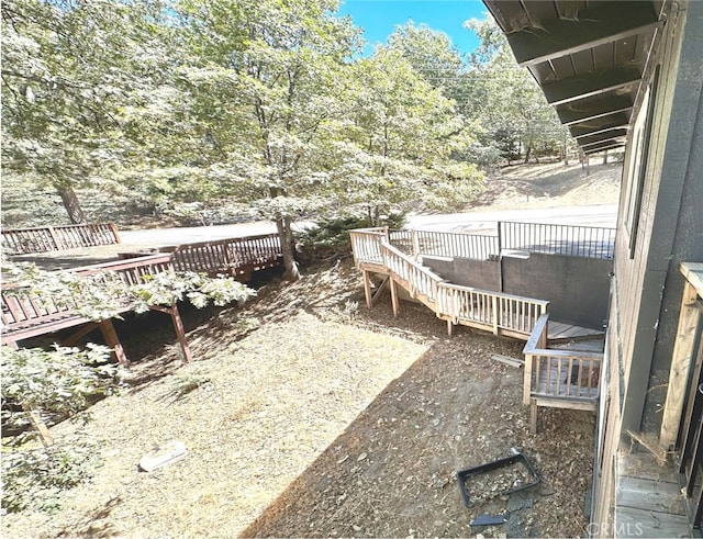 view of yard featuring a deck