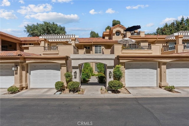 multi unit property featuring a balcony