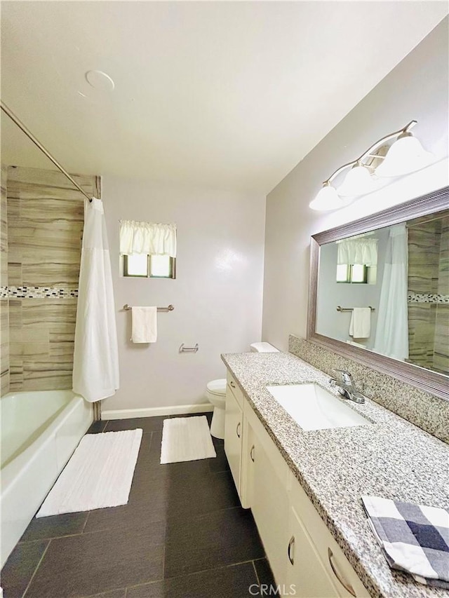 full bathroom with shower / bath combo with shower curtain, vanity, and toilet