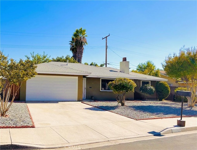 ranch-style home with a garage