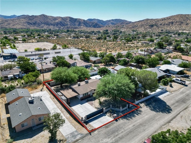 aerial view with a mountain view and a residential view