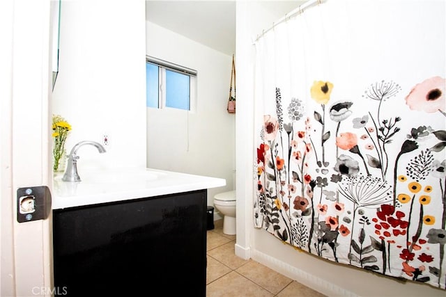 bathroom with toilet, tile patterned floors, shower / bathtub combination with curtain, and vanity
