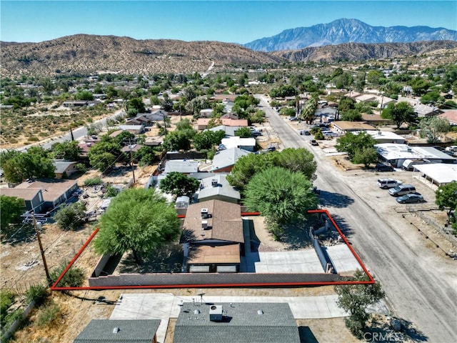 bird's eye view with a residential view and a mountain view