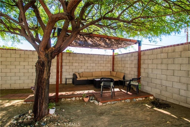 view of patio / terrace featuring an outdoor hangout area, a fenced backyard, and a deck