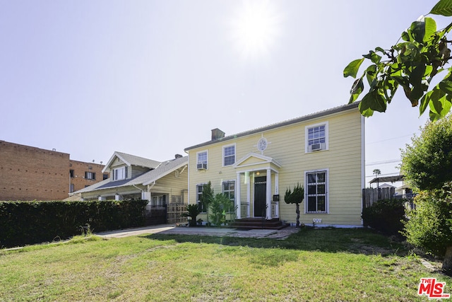 view of front of property with a front yard