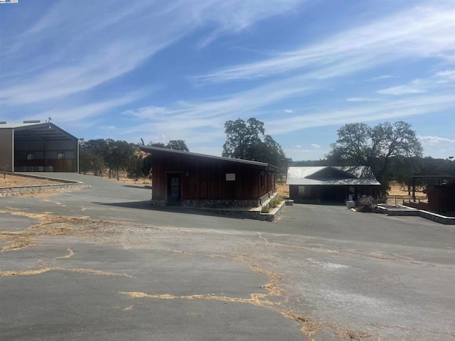 exterior space with a carport