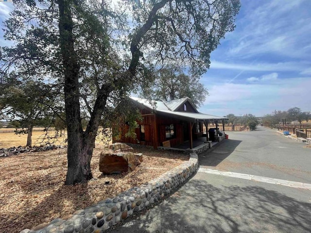 exterior space with a rural view