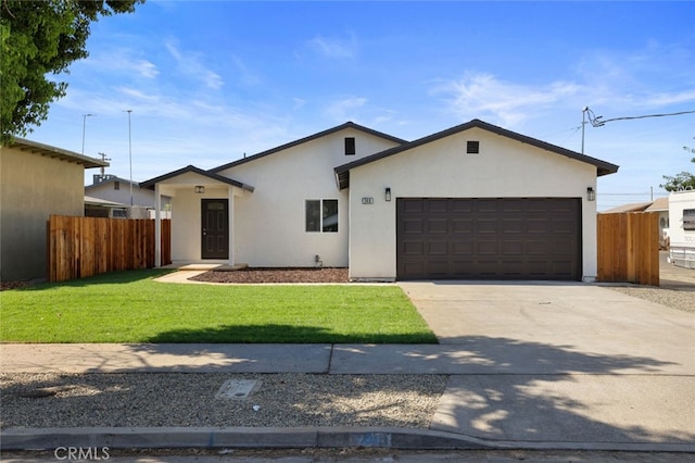 ranch-style house with a front lawn and a garage