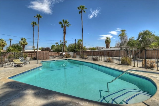 74761 Leslie Ave, Palm Desert, CA 92260 - community pool with a patio area