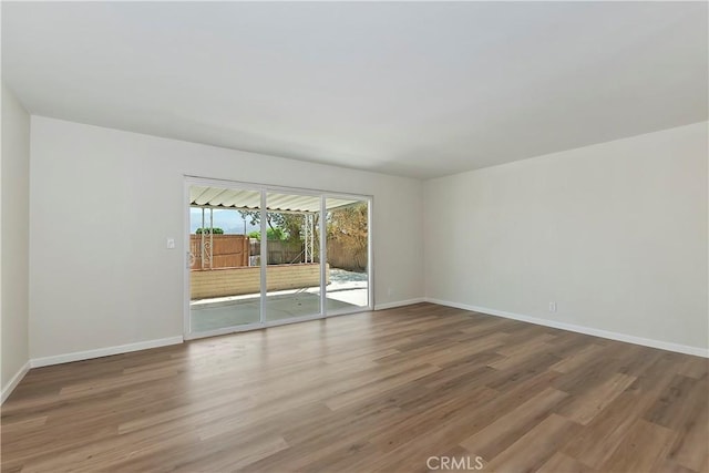 74761 Leslie Ave, Palm Desert, CA 92260 - unfurnished room featuring wood finished floors