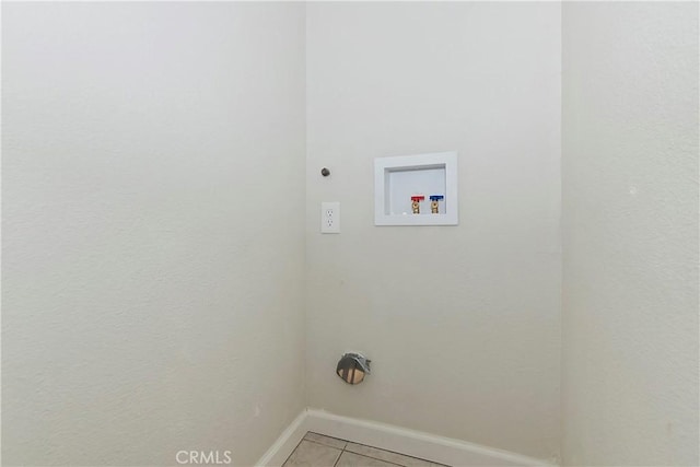 74761 Leslie Ave, Palm Desert, CA 92260 - laundry room with light tile patterned flooring and hookup for a washing machine