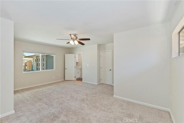 74761 Leslie Ave, Palm Desert, CA 92260 - unfurnished bedroom featuring light carpet and a ceiling fan