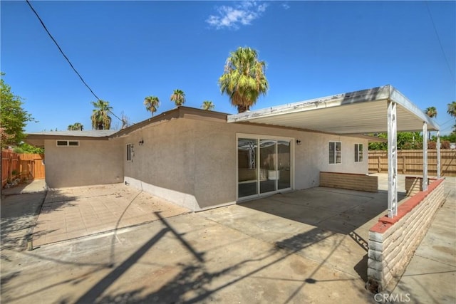 back of house featuring a patio area