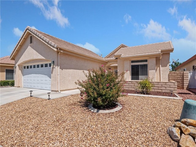 single story home with a garage