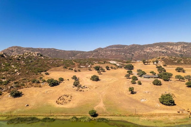 mountain view with a water view and a rural view