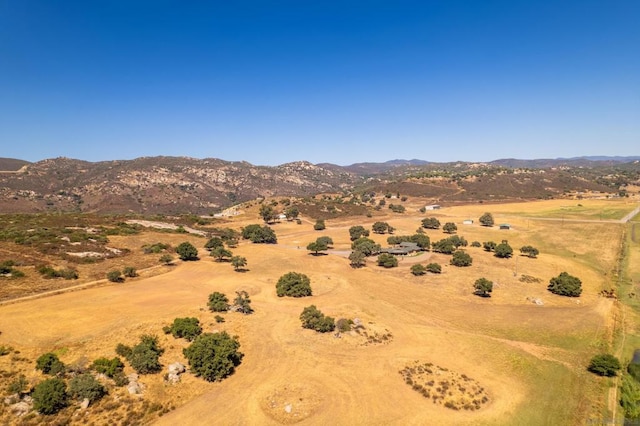 aerial view featuring a mountain view and a rural view