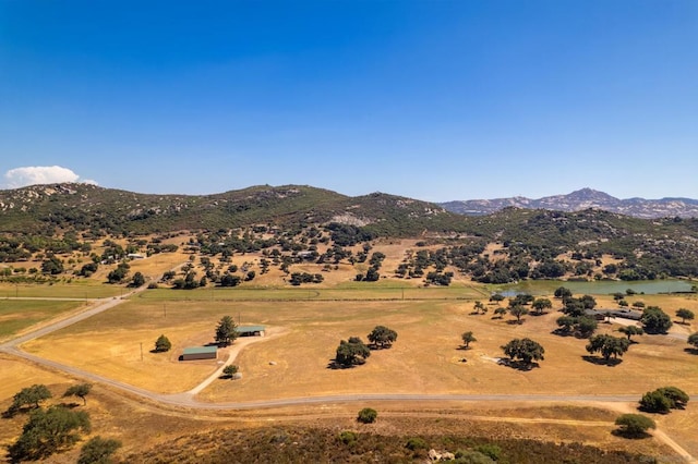 mountain view featuring a rural view