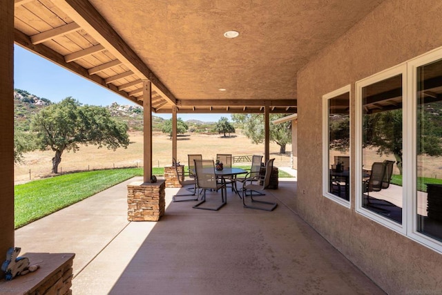 view of patio / terrace featuring a rural view