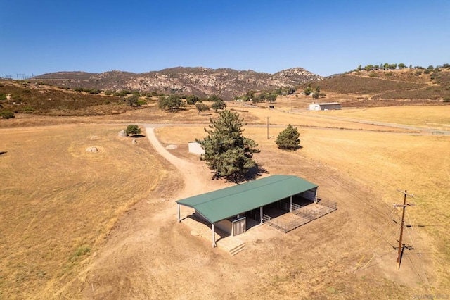 bird's eye view with a mountain view and a rural view