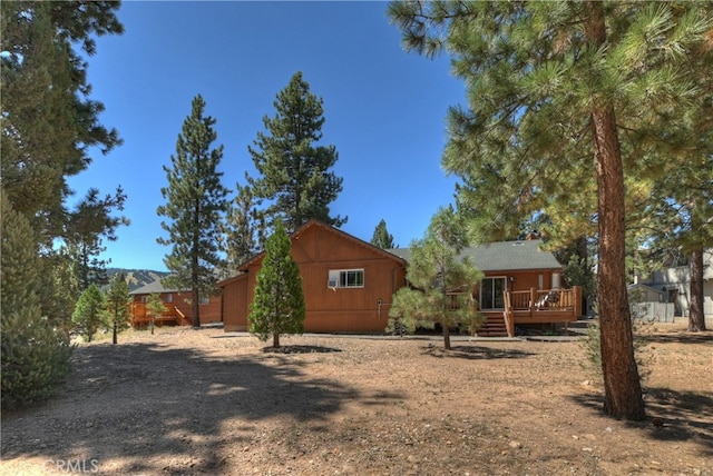 exterior space with a wooden deck