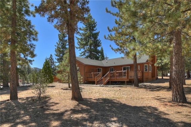 rear view of house with a deck