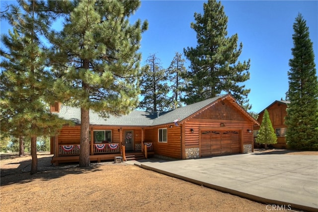 cabin featuring a garage