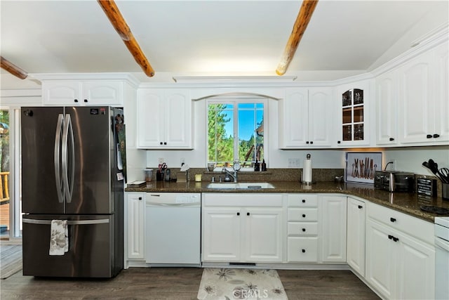 kitchen with stainless steel refrigerator, sink, white dishwasher, and white cabinetry