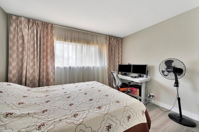 bedroom featuring light hardwood / wood-style flooring