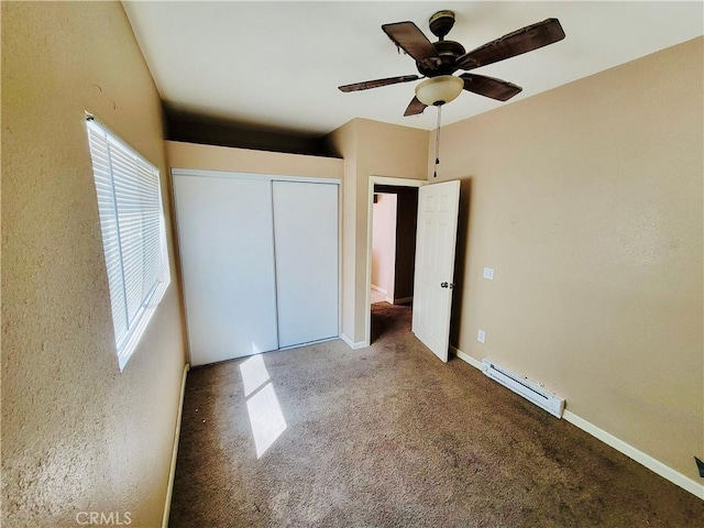 23960 Norma Dr, Menifee, CA 92587 - unfurnished bedroom featuring carpet flooring, ceiling fan, a closet, and a baseboard radiator