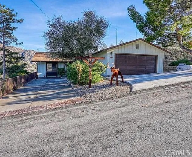 single story home featuring a garage