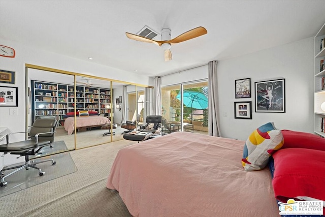 carpeted bedroom featuring ceiling fan, access to outside, and a closet